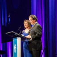 Jim and Donna Brooks speaking at Enrichment.